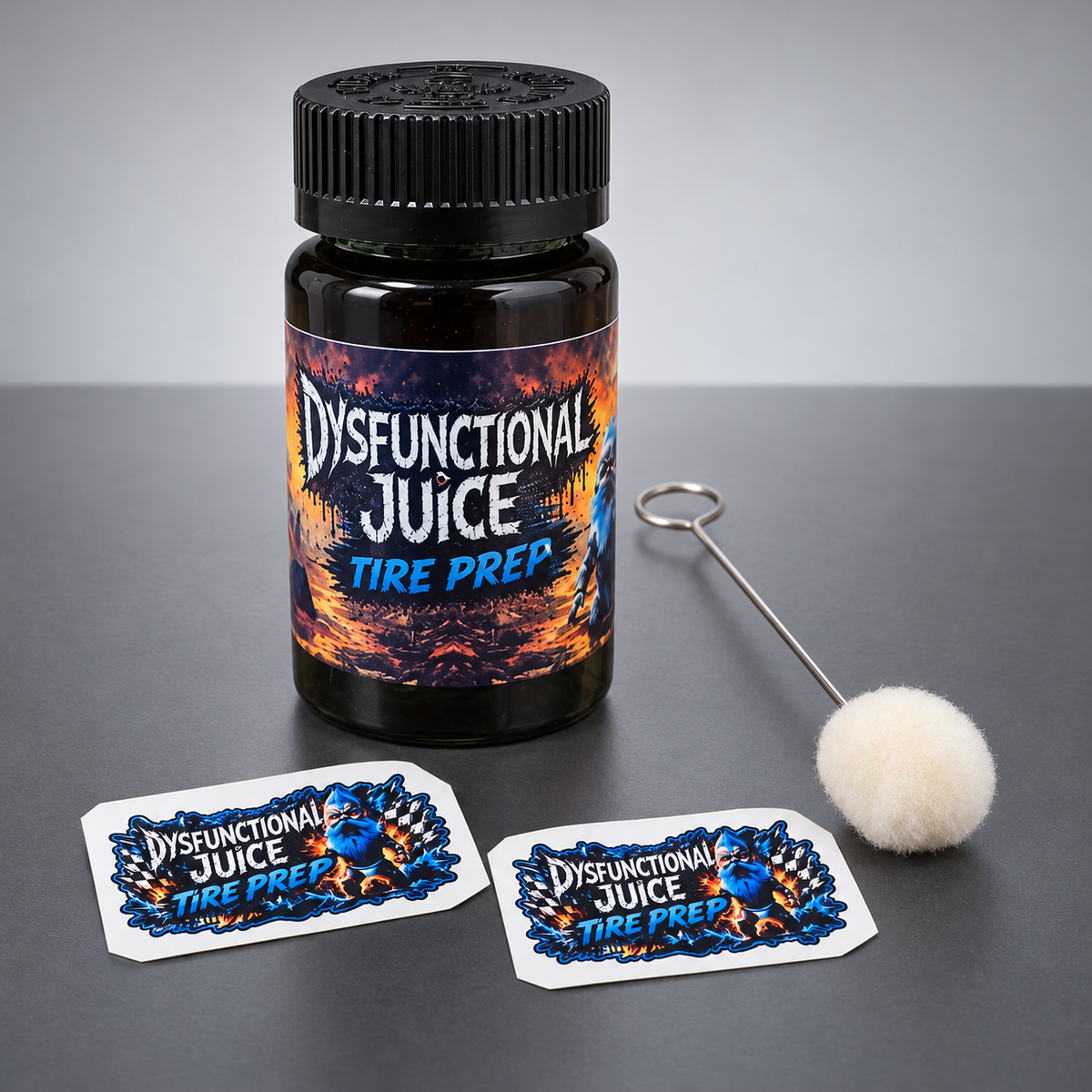 Dysfunctional Juice Tire Prep, 4 oz bottle, with free external wool dauber and two example stickers. Sticker designs vary.
